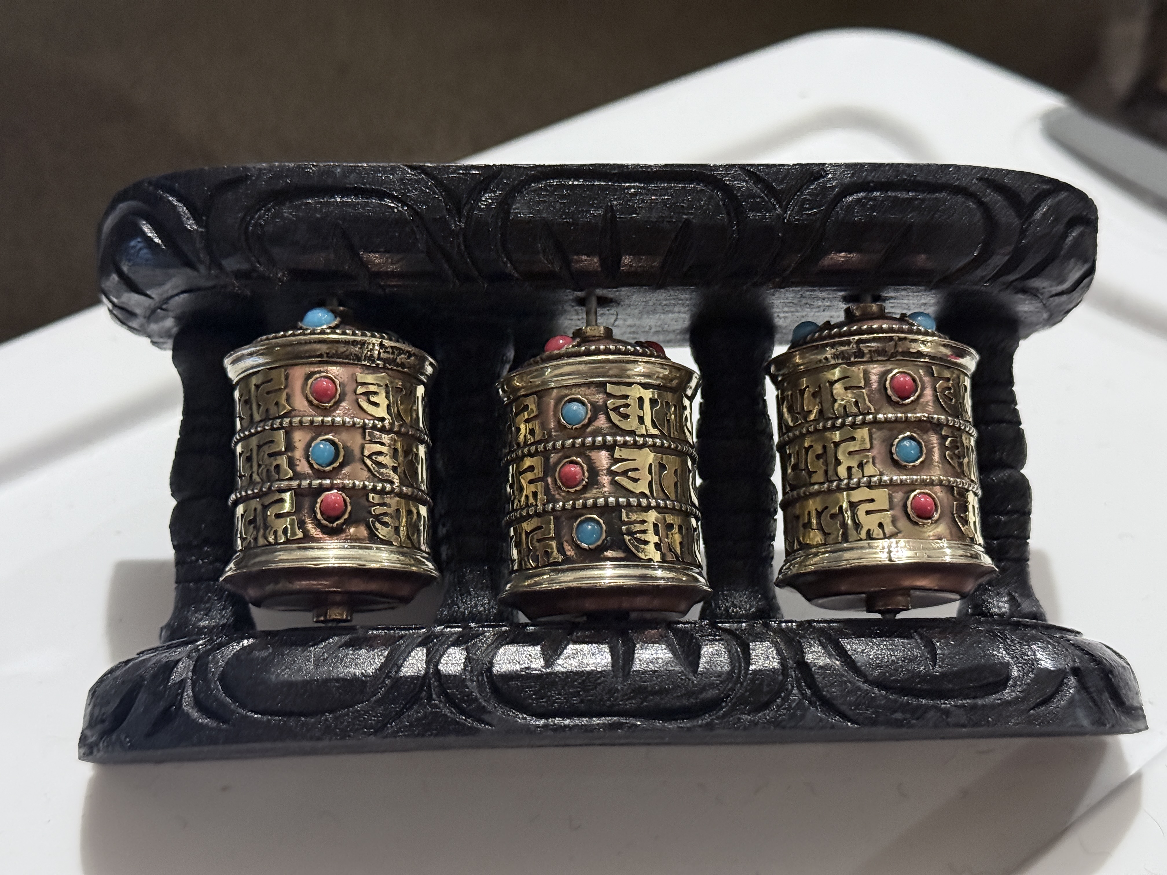 Triple Tibetan Prayer Wheel – Carved Wooden Base